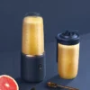 S72d6d453f88d4fd08fdbacc7ebeeeb91j.webp Portable USB Personal Blender | 6-Blade Mini Fruit Juice & Smoothie Maker